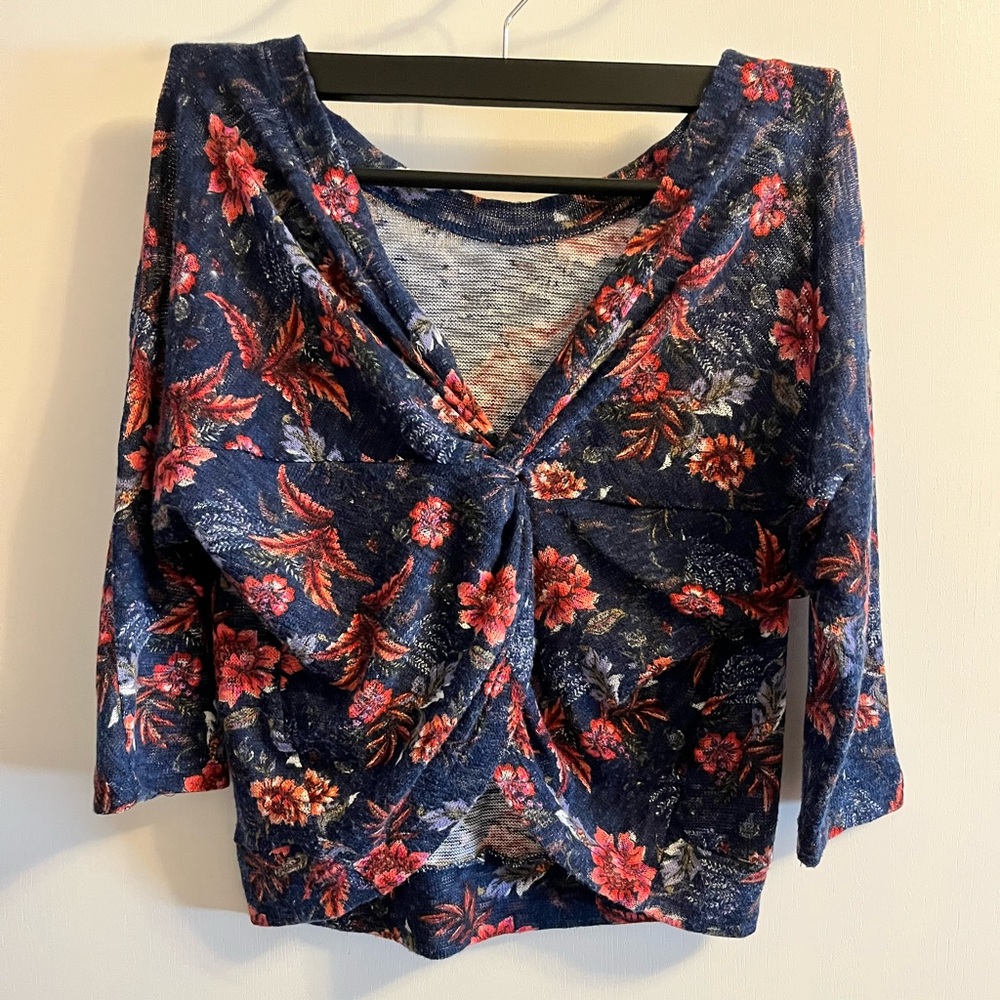 Floral cropped top with open back.